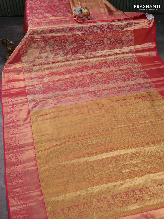 Pure kanchipuram tissue silk saree dual shade of peach pink with allover zari woven brocade weaves and zari woven border