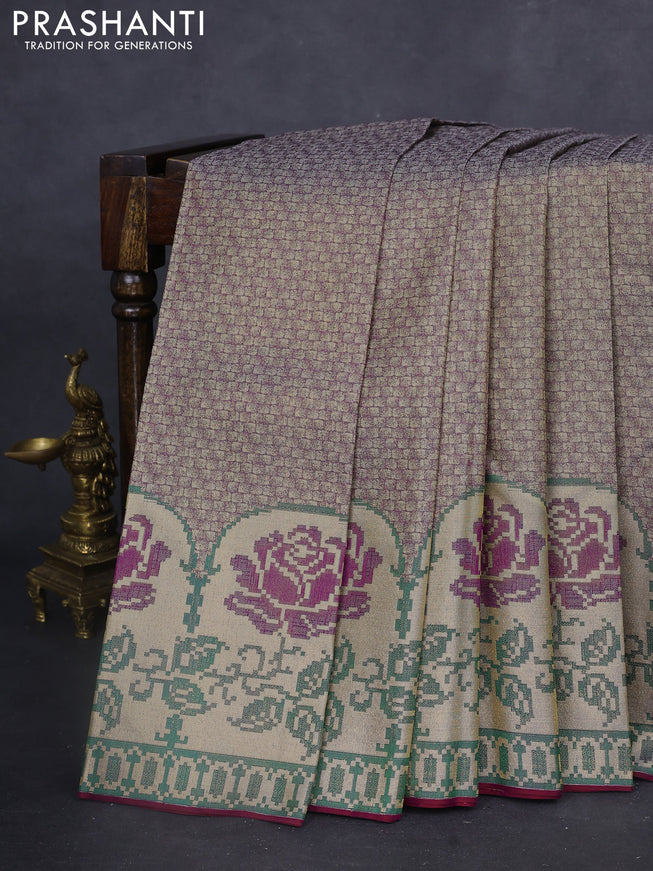 Pure kanchipuram tissue silk saree purple and green with allover zari woven brocade weaves and floral design zari woven border