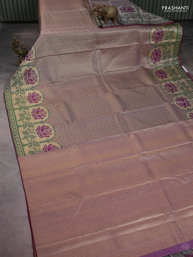 Pure kanchipuram tissue silk saree purple and green with allover zari woven brocade weaves and floral design zari woven border
