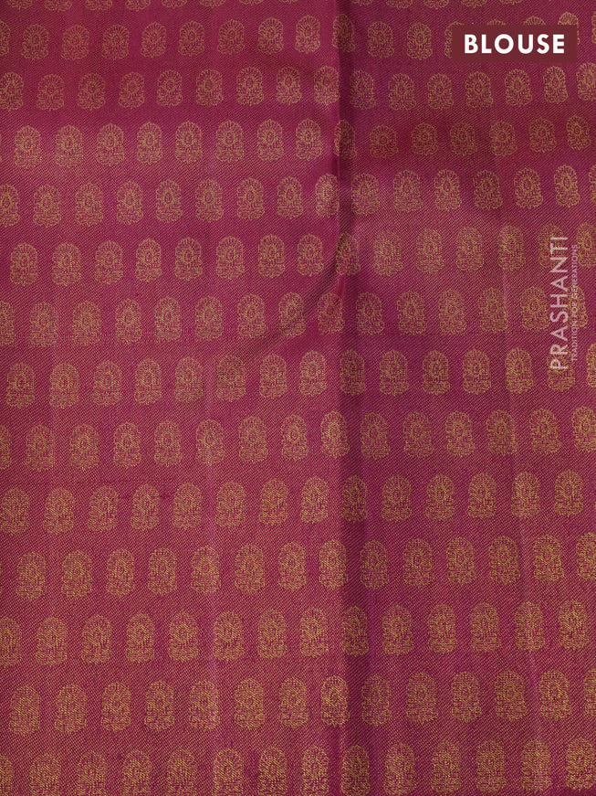 Pure kanchipuram tissue silk saree purple and green with allover zari woven brocade weaves and floral design zari woven border