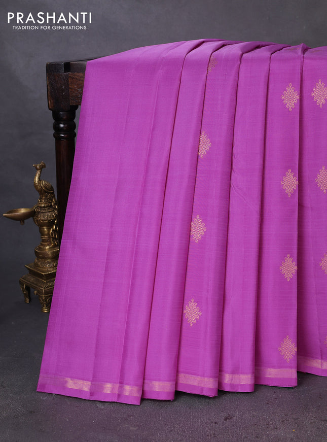 Pure kanchipuram silk saree lotus pink and bottle green with zari woven rangoli buttas and small zari woven border