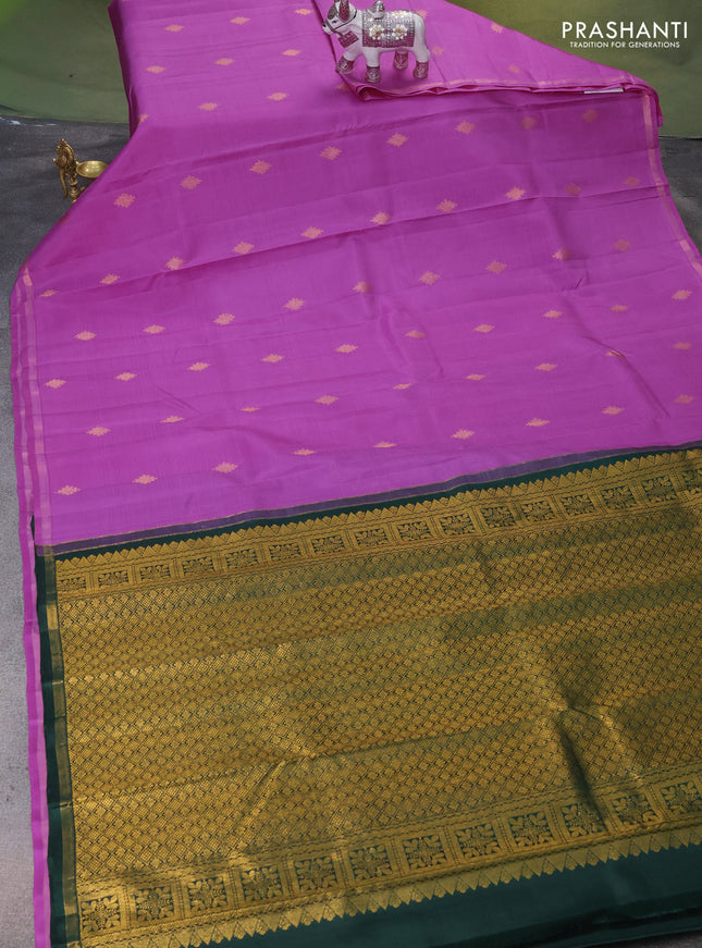 Pure kanchipuram silk saree lotus pink and bottle green with zari woven rangoli buttas and small zari woven border