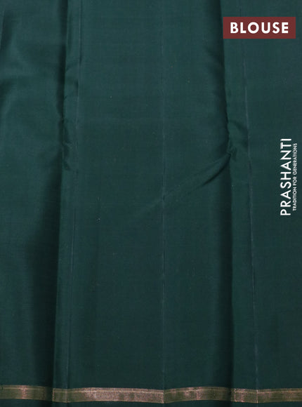 Pure kanchipuram silk saree lotus pink and bottle green with zari woven rangoli buttas and small zari woven border