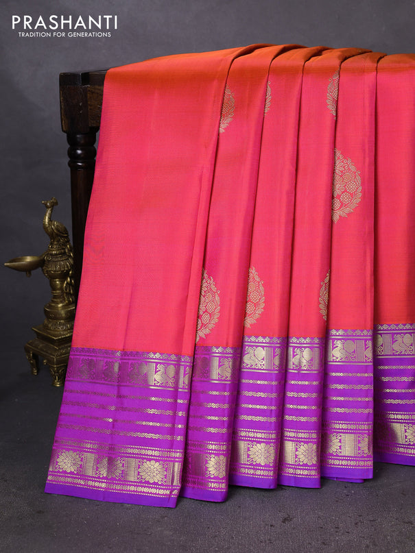 Pure kanchipuram silk saree dual shade of pinkish orange and purple with zari woven buttas and rich zari woven border
