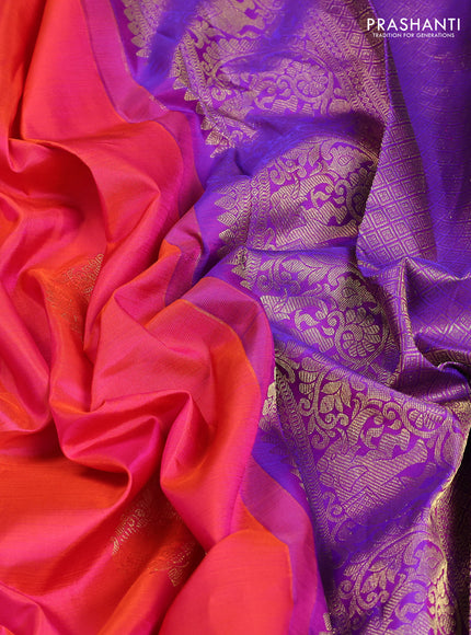 Pure kanchipuram silk saree dual shade of pinkish orange and purple with zari woven buttas and rich zari woven border