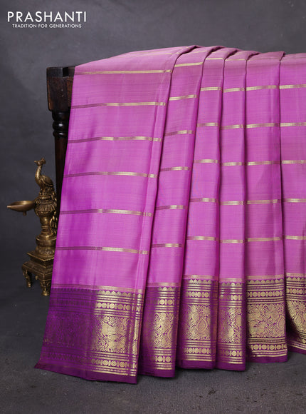 Pure kanchipuram silk saree lavender and purple with allover zari woven strip pattern and rich zari woven border