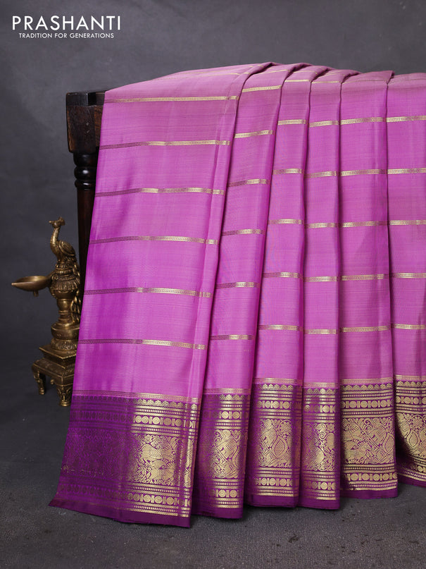 Pure kanchipuram silk saree lavender and purple with allover zari woven strip pattern and rich zari woven border