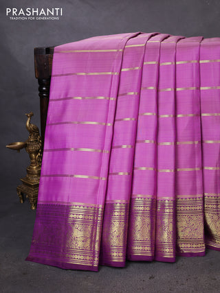 Pure kanchipuram silk saree lavender and purple with allover zari woven strip pattern and rich zari woven border