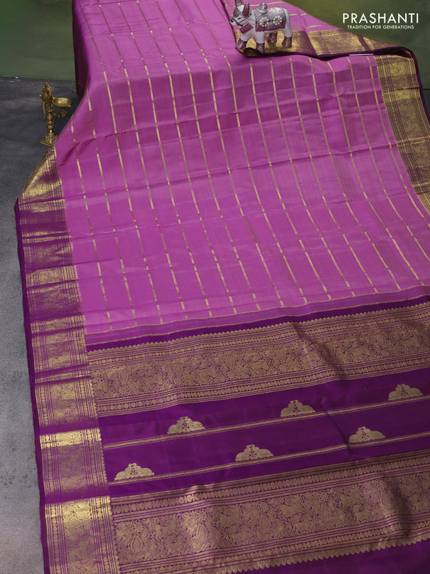 Pure kanchipuram silk saree lavender and purple with allover zari woven strip pattern and rich zari woven border