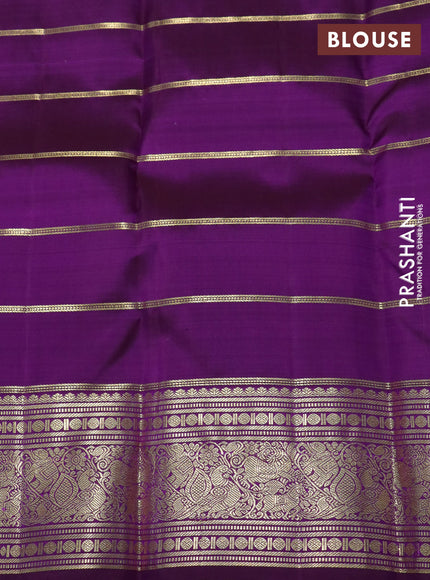 Pure kanchipuram silk saree lavender and purple with allover zari woven strip pattern and rich zari woven border