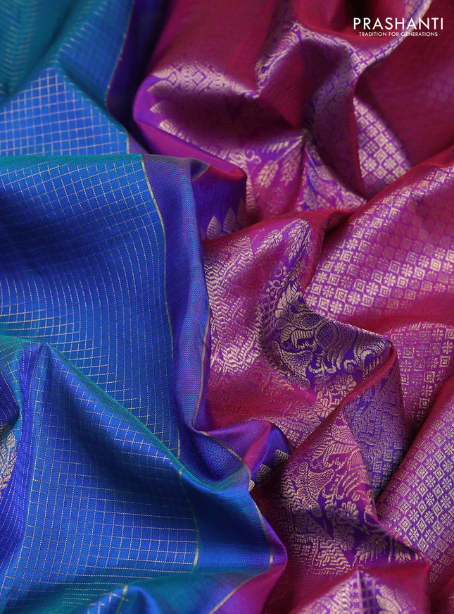 Pure kanchipuram silk saree dual shade of bluish green and purple with allover zari checks & paisley buttas and rich zari woven border