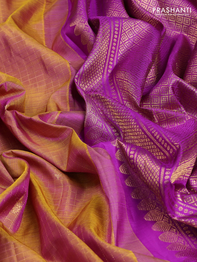 Pure kanchipuram silk saree dual shade of purplish green and purple with allover zari checks & buttas and zari woven border