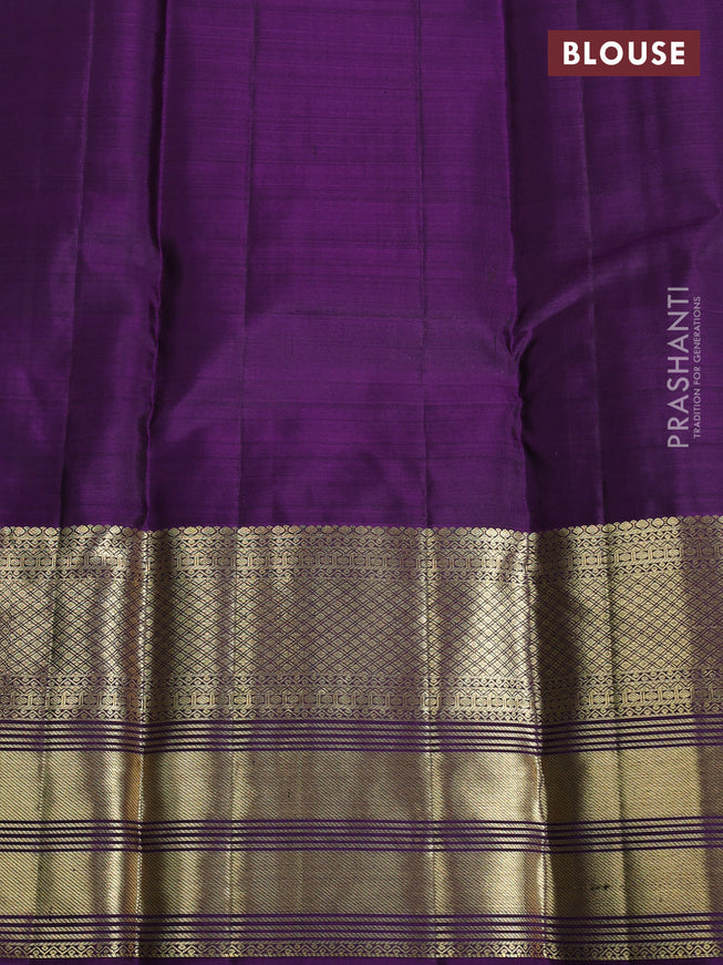 Pure kanchipuram silk saree green and violet with allover zari checks & buttas and long zari woven border