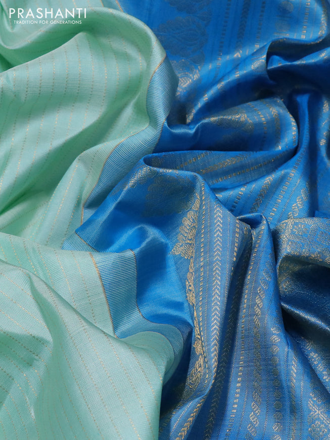 Pure kanchipuram silk saree teal shade and blue with allover zari woven strip pattern and rettapet zari woven butta border