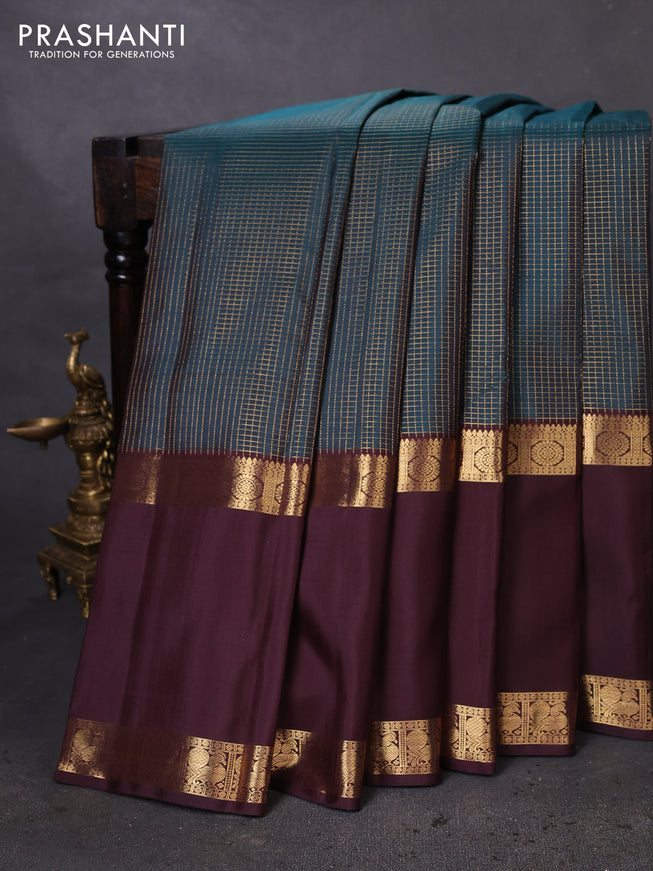 Pure kanchipuram silk saree peacock green and coffee brown with allover small zari checked pattern and long rettapet zari woven border