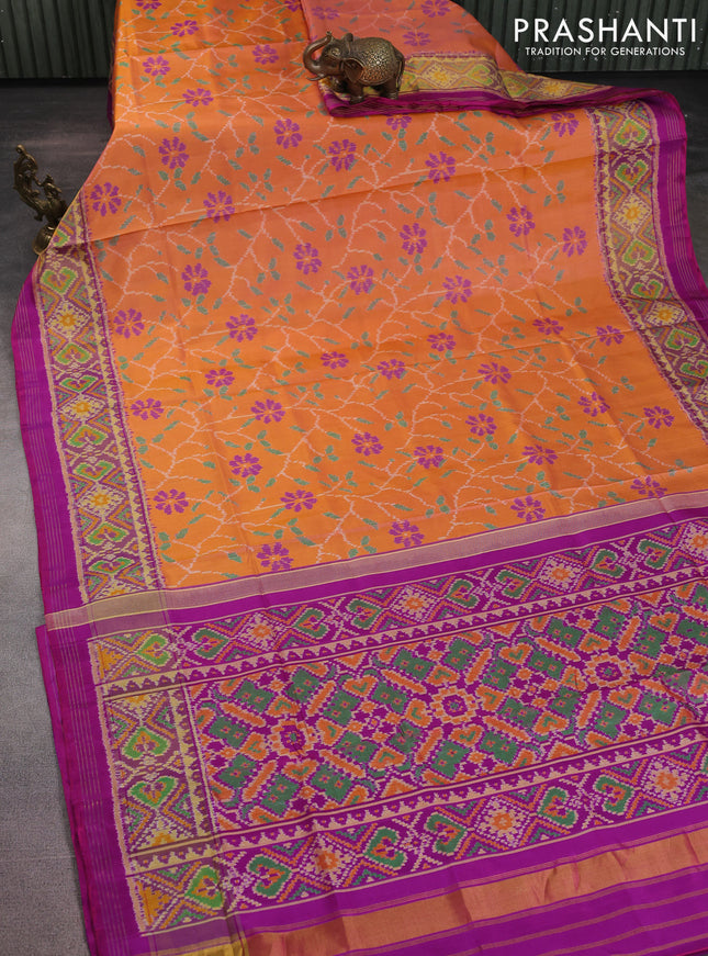 Rajkot patola silk saree orange and purple with allover ikat weaves and ikat woven border