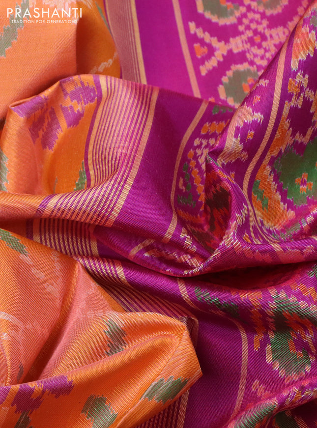 Rajkot patola silk saree orange and purple with allover ikat weaves and ikat woven border