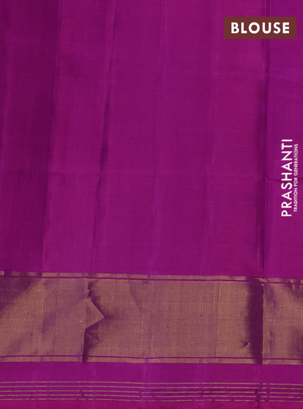Rajkot patola silk saree orange and purple with allover ikat weaves and ikat woven border