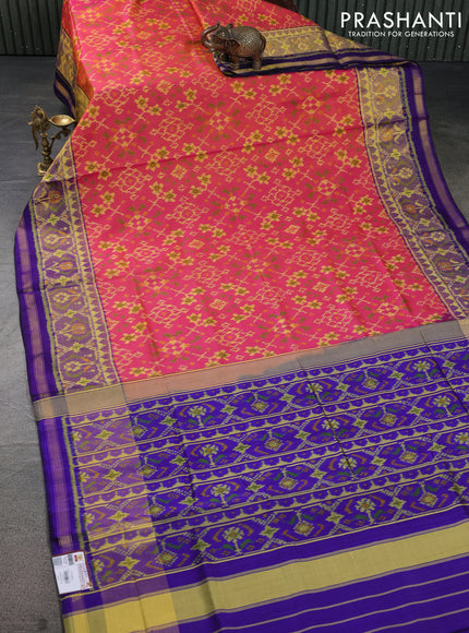 Rajkot patola silk saree dual shade of pinkish orange and blue with allover ikat weaves and ikat woven border