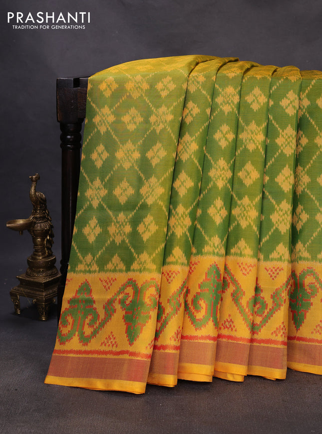 Rajkot patola silk saree green and yellow with allover ikat weaves and ikat woven zari border