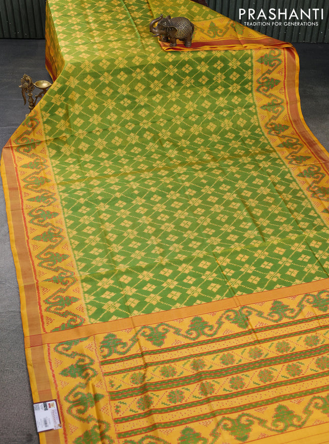 Rajkot patola silk saree green and yellow with allover ikat weaves and ikat woven zari border
