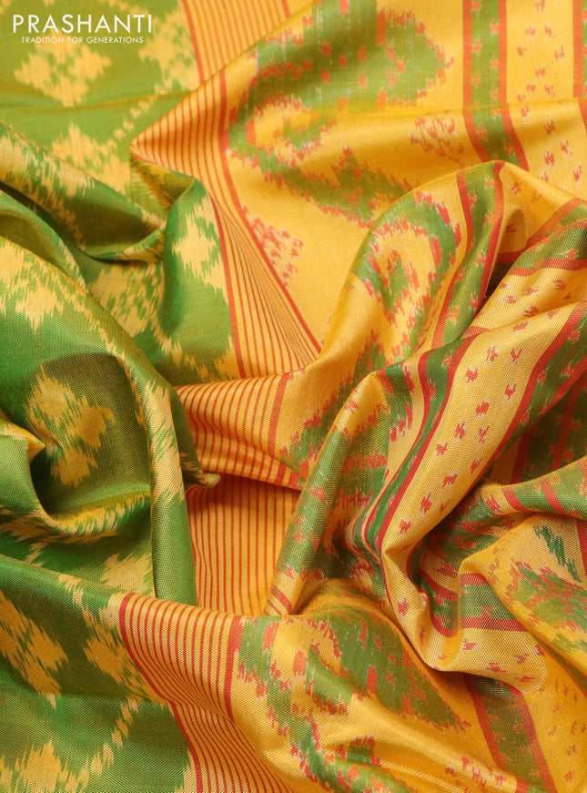 Rajkot patola silk saree green and yellow with allover ikat weaves and ikat woven zari border