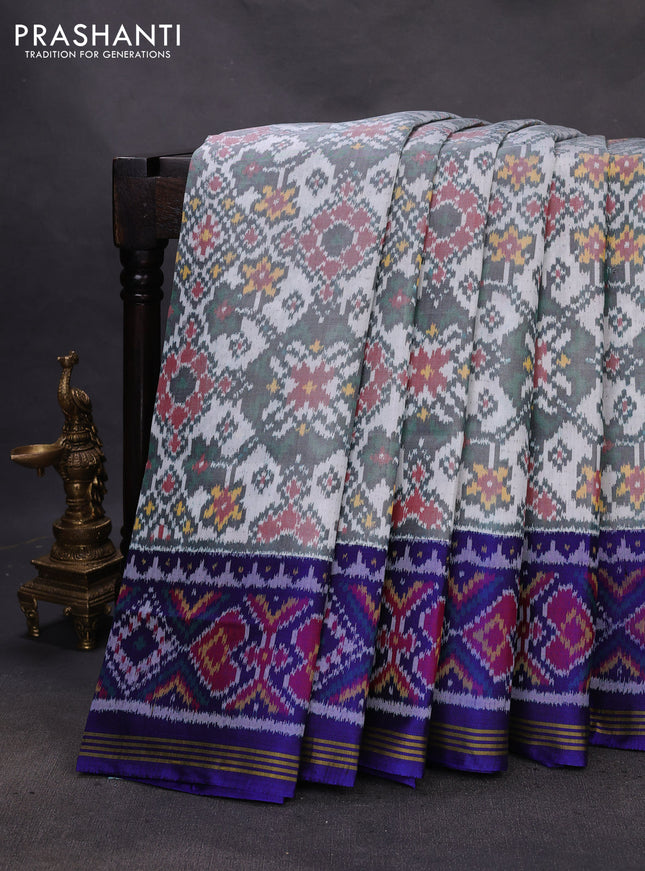 Rajkot patola silk saree blue with allover ikat weaves and ikat woven border