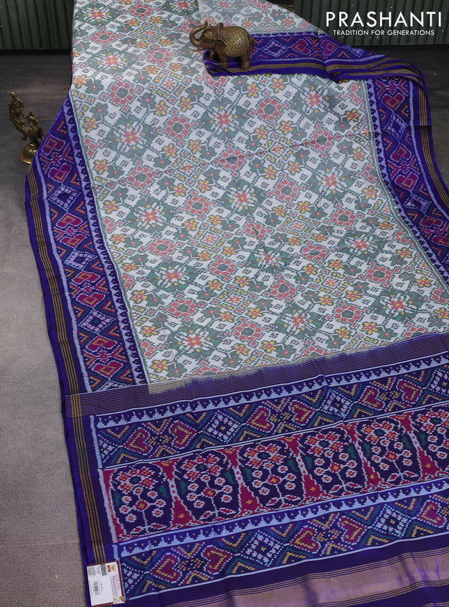 Rajkot patola silk saree blue with allover ikat weaves and ikat woven border