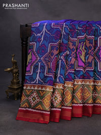 Rajkot patola silk saree blue and red with allover patola weaves and ikat woven zari border