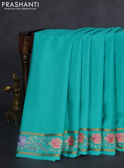 Pure mysore silk saree teal blue with plain body and floral embroidery cut work border