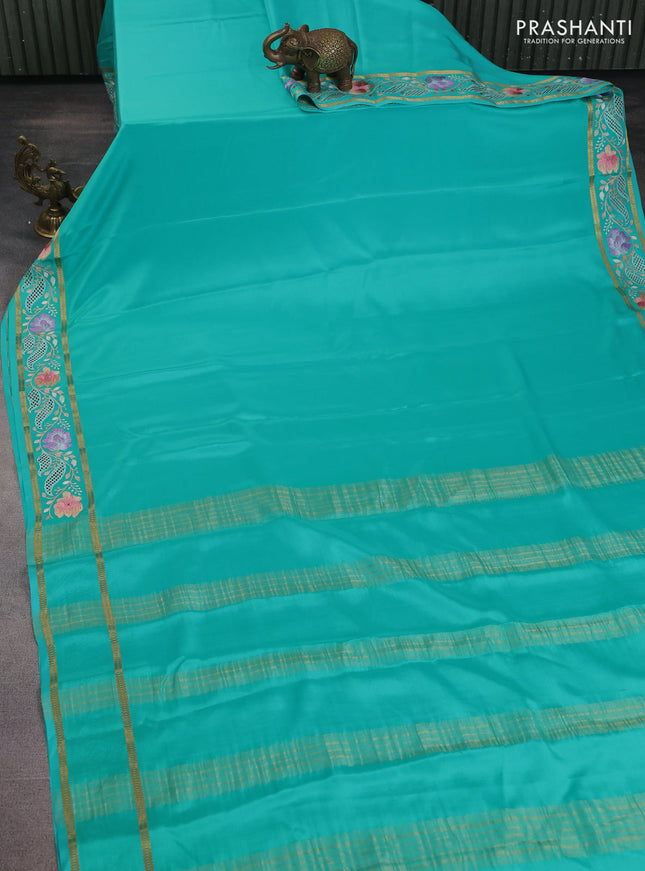 Pure mysore silk saree teal blue with plain body and floral embroidery cut work border