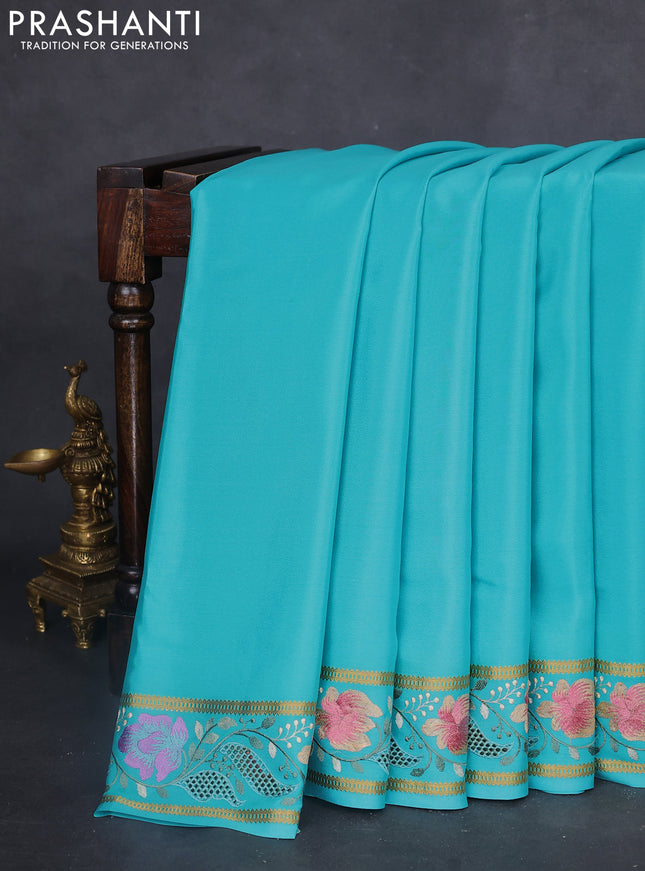 Pure mysore silk saree teal blue with plain body and floral embroidery cut work border