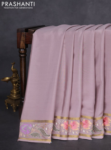 Pure mysore silk saree pastel brown shade with plain body and floral embroidery cut work border
