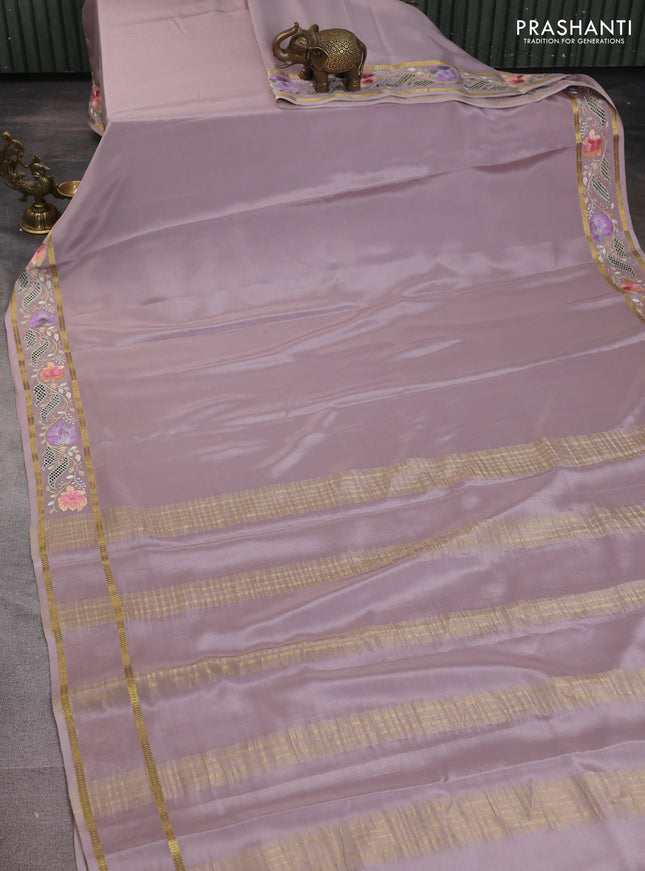 Pure mysore silk saree pastel brown shade with plain body and floral embroidery cut work border