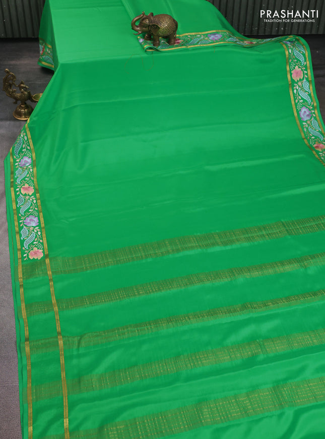 Pure mysore silk saree green with plain body and floral embroidery cut work border