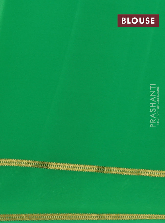 Pure mysore silk saree green with plain body and floral embroidery cut work border