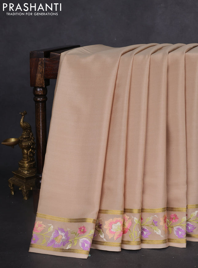 Pure mysore silk saree beige with plain body and floral embroidered zari border