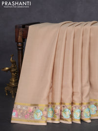 Pure mysore silk saree beige with plain body and embroidered zari border