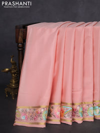 Pure mysore silk saree peach orange with plain body and embroidered zari border