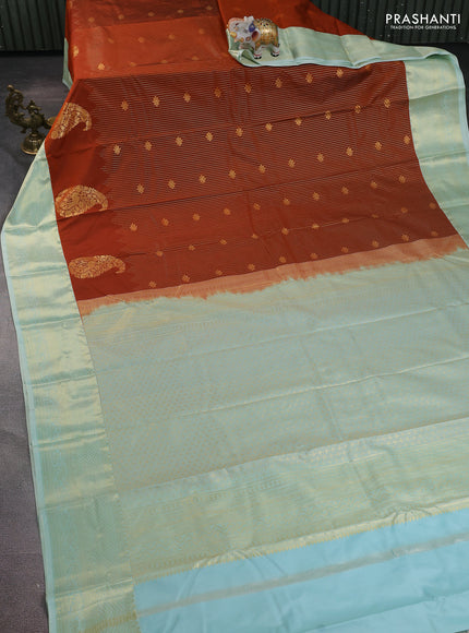 Bangalori silk saree rust shade and pastel green with allover zari stripe pattern and zari woven border