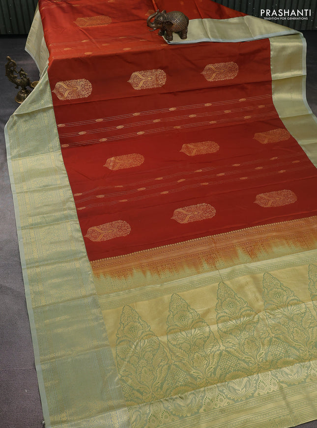 Bangalori silk saree rustic orange and pista green shade with zari woven buttas and zari woven border