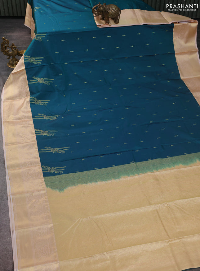 Bangalori silk saree peacock blue and pastel peach with zari woven buttas and zari woven border