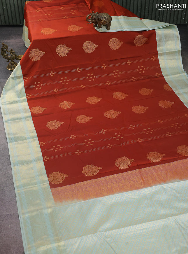 Bangalori silk saree rustic orange and teal shade with zari woven buttas and zari woven border