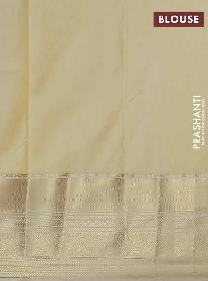 Bangalori silk saree dual shade of rust and cream with zari woven buttas and long zari woven border
