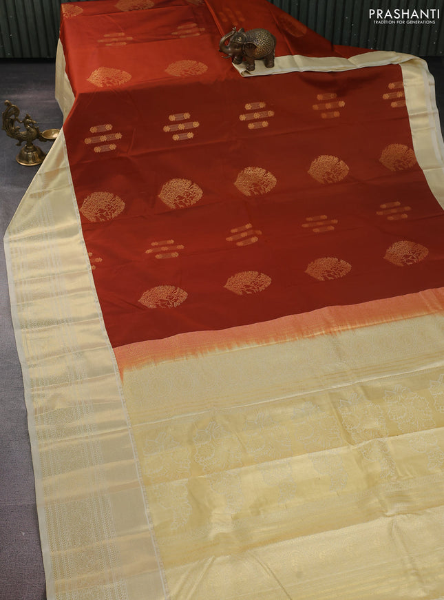 Bangalori silk saree rust shdae and cream with zari woven buttas and long zari woven border