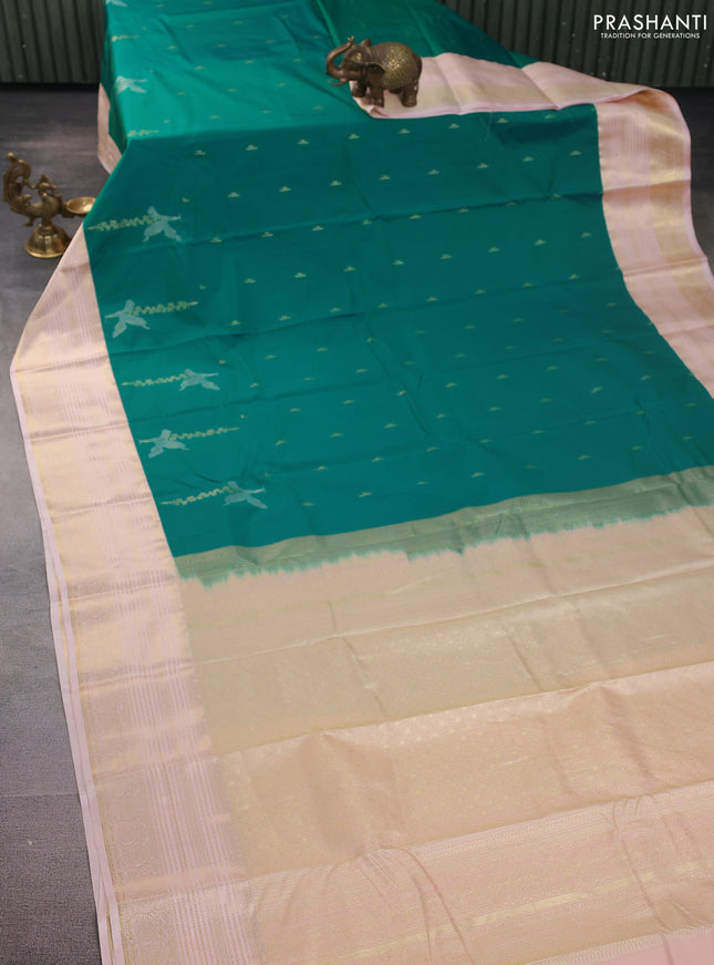 Bangalori silk saree teal green and pastel peach with zari woven buttas and zari woven border