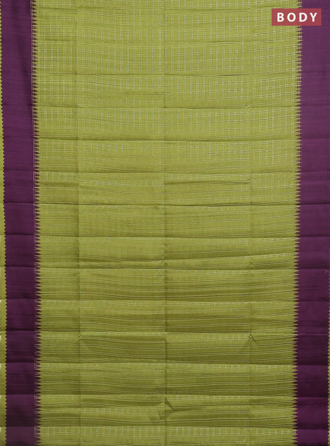 Semi tussar saree light green and deep purple with allover zari checked pattern and rettapet zari woven border