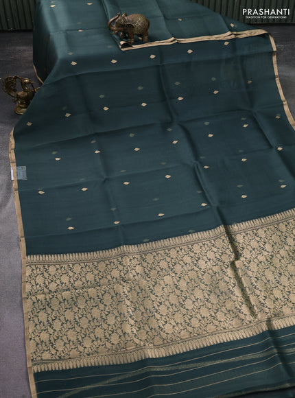 Banarasi organza silk saree greyish green with zari woven buttas and zari woven piping border