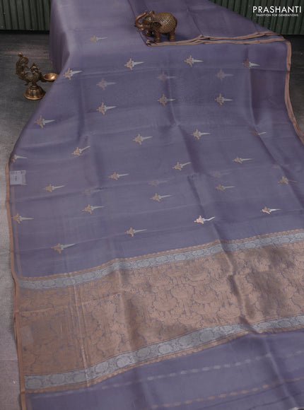 Banarasi organza silk saree pastel lavender with zari woven buttas and zari woven piping border