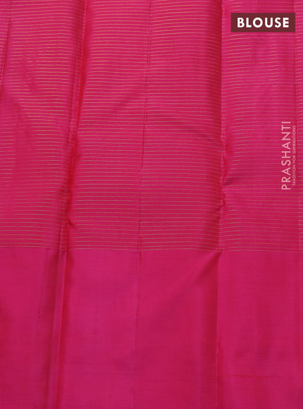 Pure kanchipuram silk saree green and purple with allover small zari checked pattern and zari woven butta border